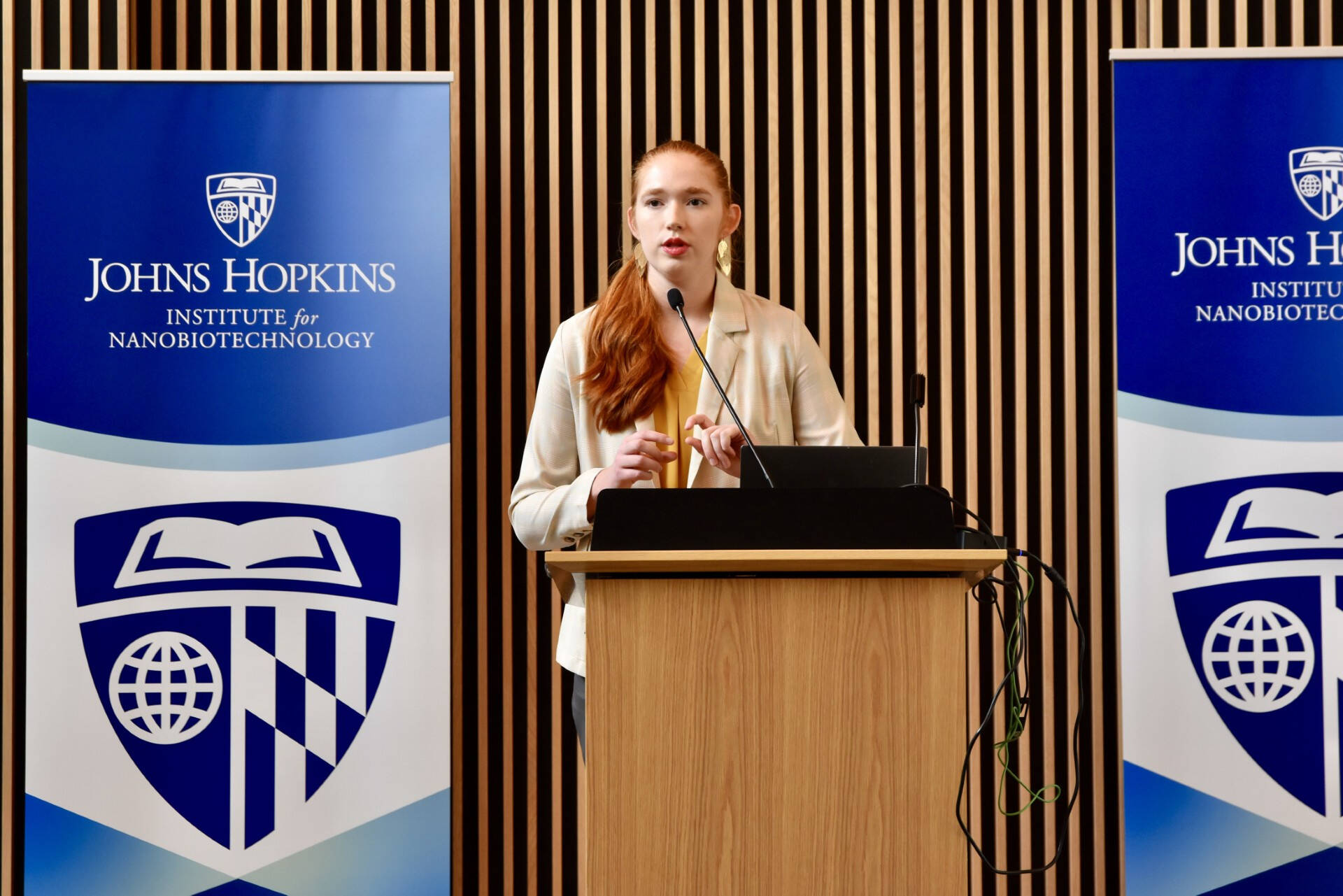 Bri presenting at conference at Johns Hopkins University.